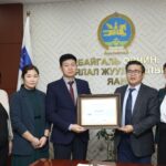 Members of the Tuul River Forum holding a certificate of the river's status