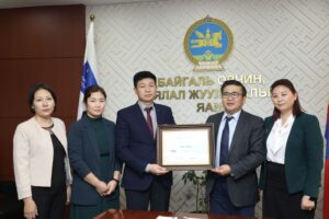 Members of the Tuul River Forum holding a certificate of the river's status