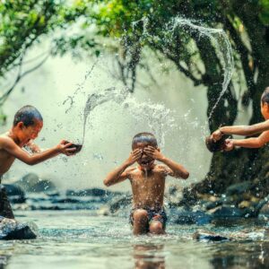 Childs splashing in the river